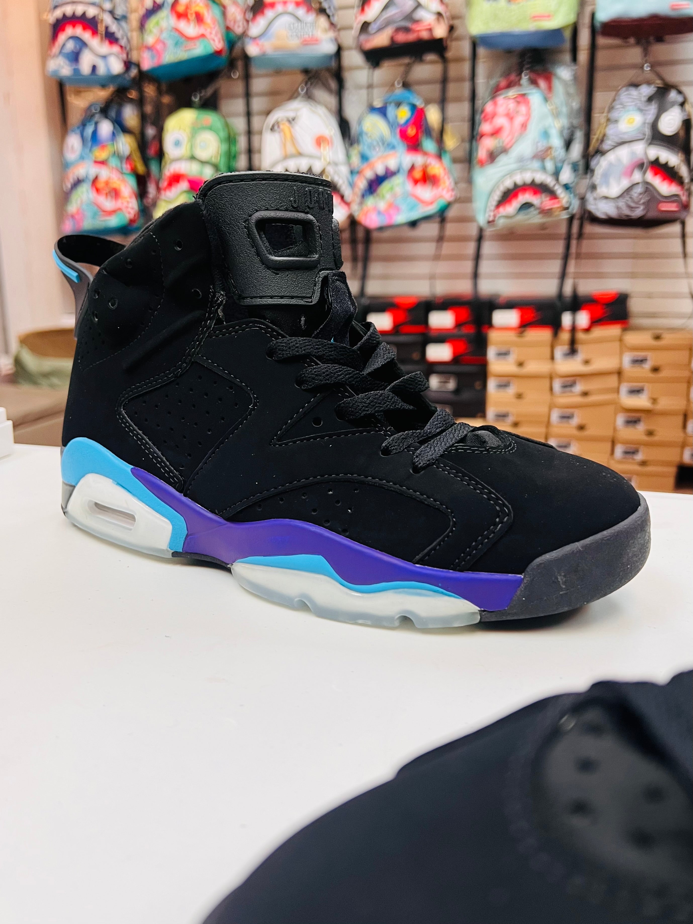 retro 6 jordans black and purple