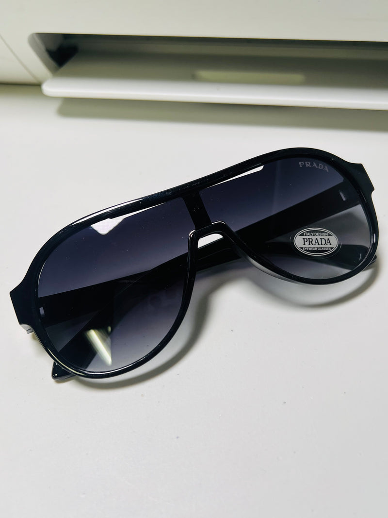 Title: Bold Elegance: Prada’s Signature Shade Collection