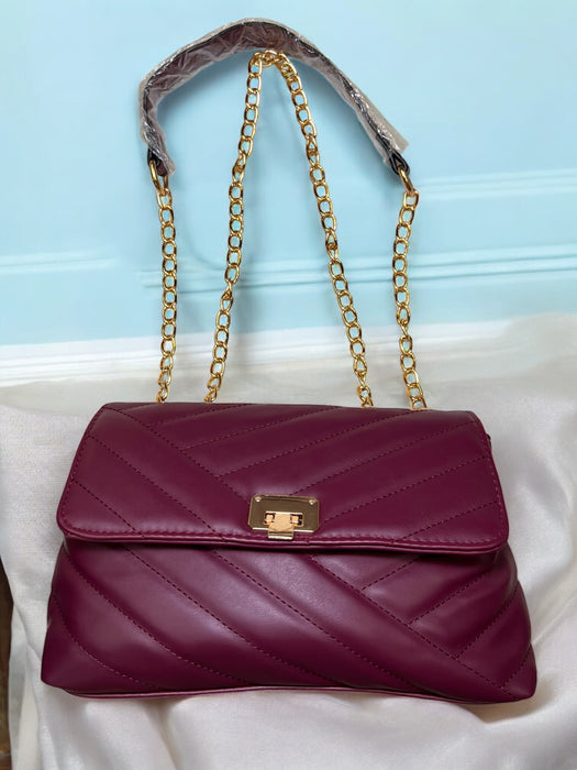 Grenobil Quilted Charm Shoulder Bag