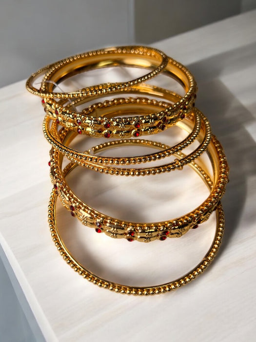 RegalGlow Gold Bangles Set with Sapphire Accents – 4pcs