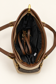 Open black-lined interior of the Coach-branded replica Leatherware patch small tote bag