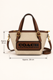 Coach-branded replica Leatherware patch small tote bag showing approximate 29 cm width and 18 cm body height