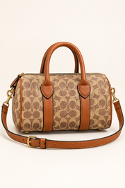 Coach monogram mini barrel bag in Tan Monogram with Caramel Trim