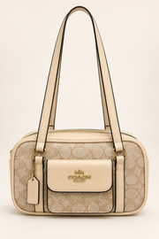 Coach monogram rounded shoulder bag in Beige