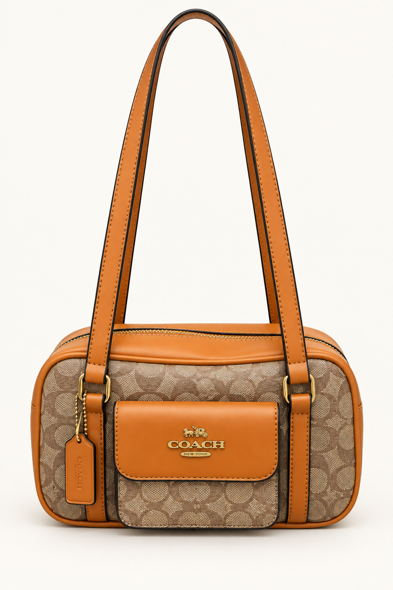 Coach monogram rounded shoulder bag in Brown