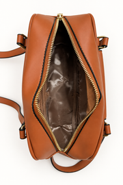 Coach-branded replica rounded shoulder bag interior, edited from the original photo, showing brown printed lining and gold top zipper
