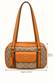 Coach monogram rounded shoulder bag measurements approximately 39 by 24 centimetres