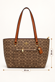 Dark brown Coach-branded replica monogram everyday tote bag showing 50 cm width and 26 cm body height